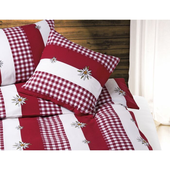 Linge de lit rouge et blanc avec motif edelweiss