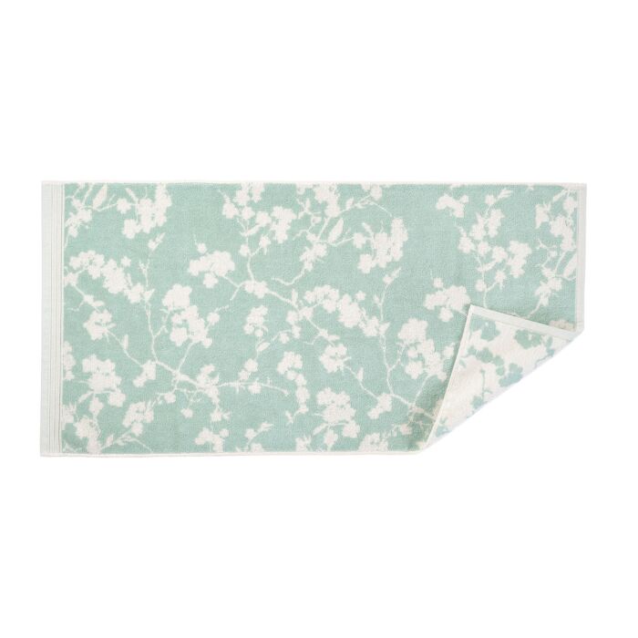 Frottier avec design fleuri raffiné