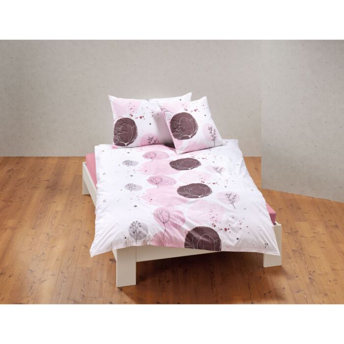 Linge de lit orné de fleurs et de cercles