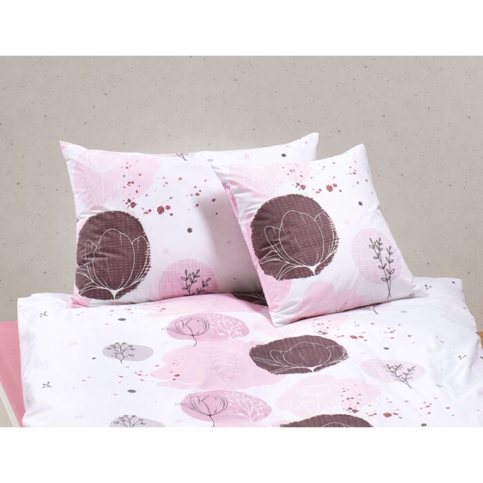 Linge de lit orné de fleurs et de cercles